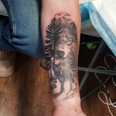 Wolf and Wilderness Tattoo